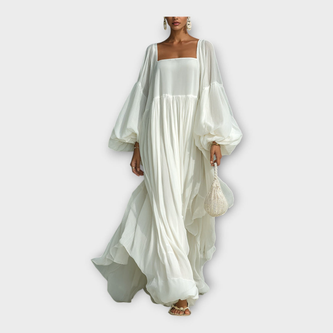 Lengva suknelė su elegantiška minimalizmo estetika