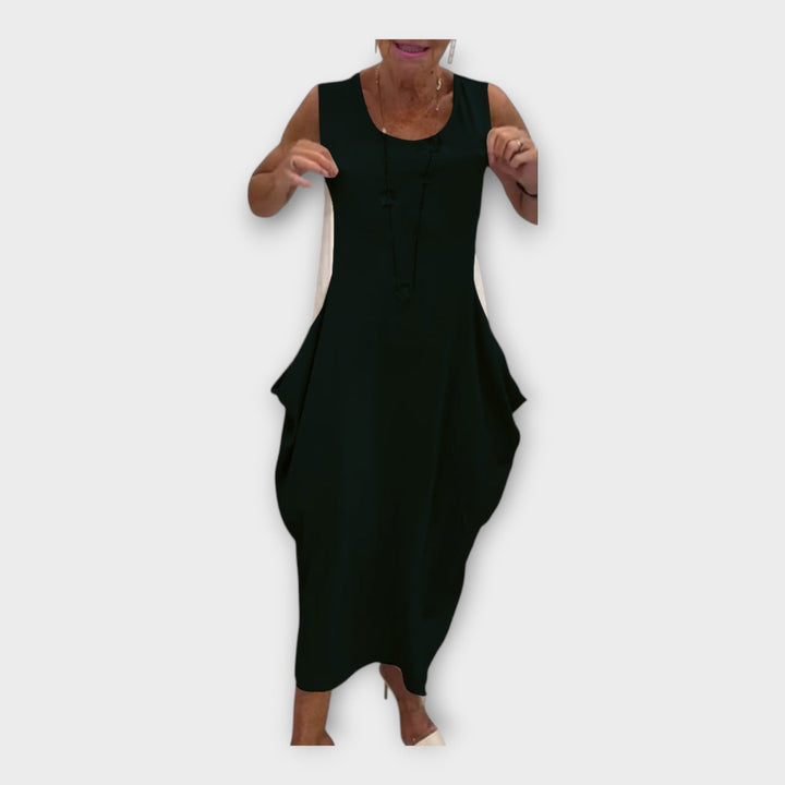 Lengva suknelė su šiuolaikiniu siluetu ir kišenėmis