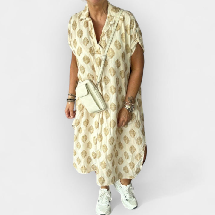 Lengva vasarinė suknelė su V formos iškirpte