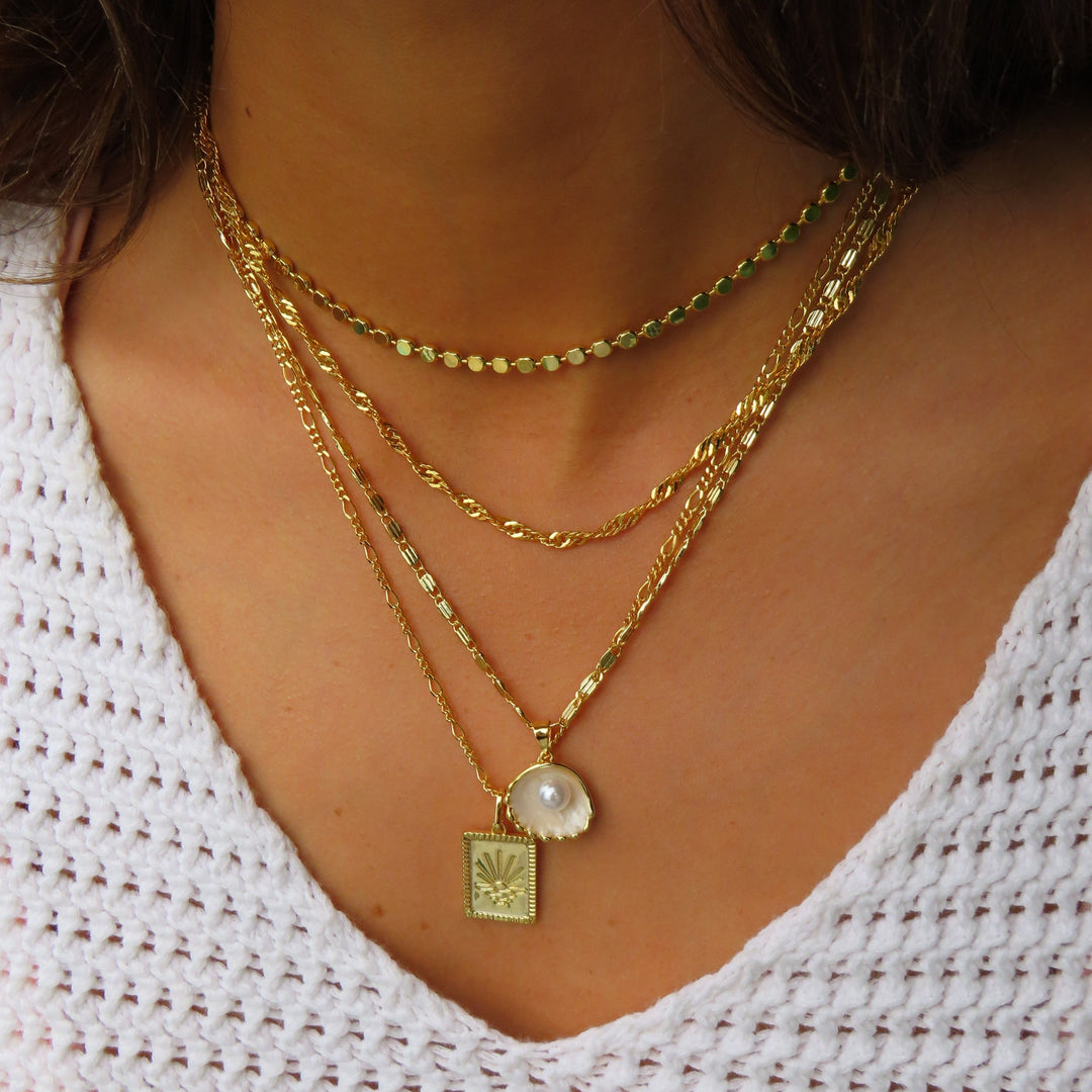 Saulės dizaino karoliai 