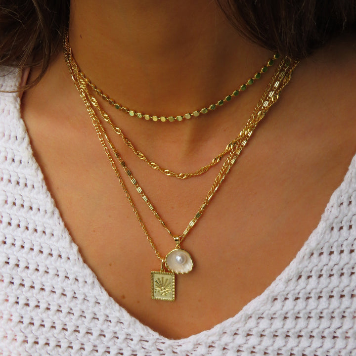 Saulės dizaino karoliai 